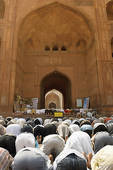 people praying in a mosque