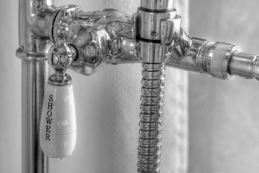 This switch will turn the water off, but a switch on the shower head will save more energy.