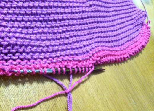 Second color joined to first, showing wrong side of fabric. Notice the "train track" where the two colors come together.
