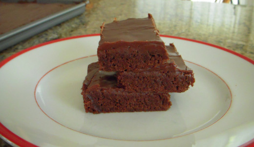 Homemade brownies with icing.