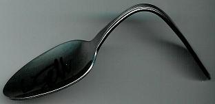 Bending spoons with only free will.  No hands were used to bend this spoon.  I know.  I did it.