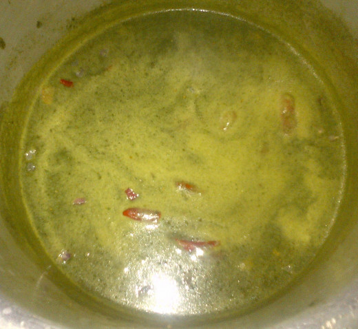 Mint juice poured inside the cooker and mixed well
