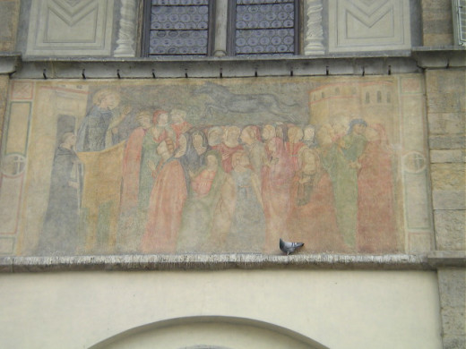 Fresco on facade of Loggia del Bigallo in Florence, Italy