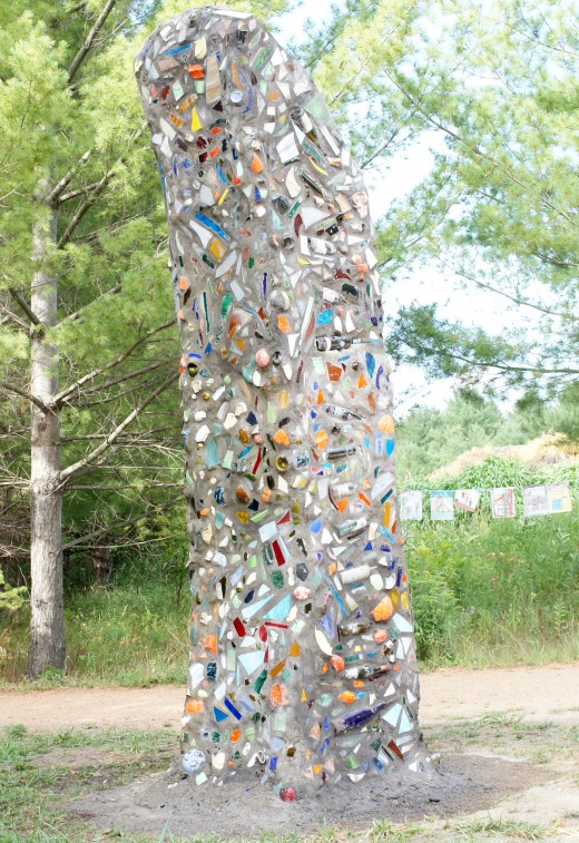This is Ben Zoltak's 8000 pound concrete, mortar, ceramic and stained glass sculpture on permanent exhibition at the Stevens Point Sculpture Park in Stevens Point, Wisconsin USA