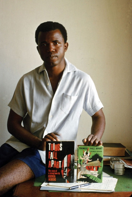 The young Chinua Achebe displaying his first novel 'Things Fall Apart'