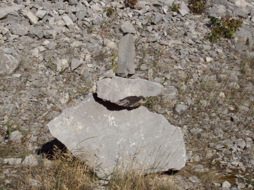 Inukshuk on Side of Road through the Frank Slide