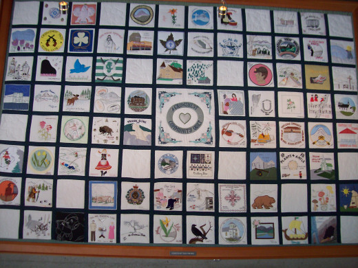 A community quilt remembering those who lost their lives.