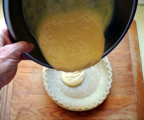 pour custard into pie shell, and cook 10 minutes