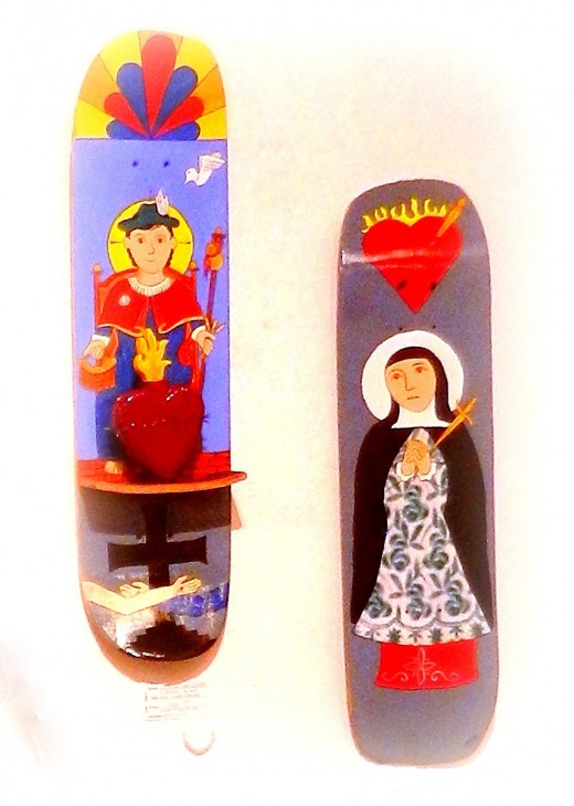 Traditional art in a contemporary way: Ronn Miera's santos on skateboards.