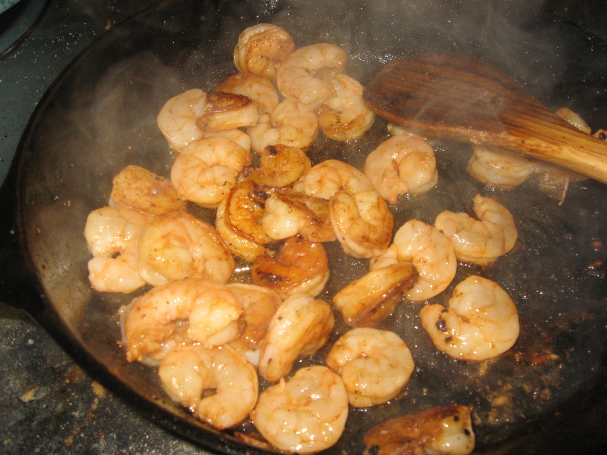 Cook shrimp.