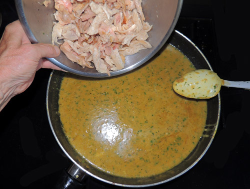 add pulled chicken to pan