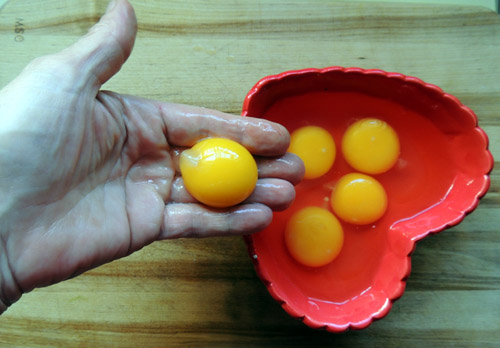 crack eggs, using 5 yolks and 3 whites
