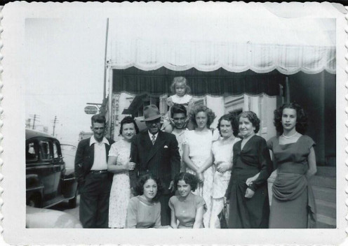 My grandfather (in the fedora) and the family.