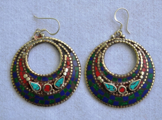 Moon shape ear ring made of german silver used with lapis, turquoise and coral each piece handcrafted by women artisans. elegant wearing, oriental look and high in fashion