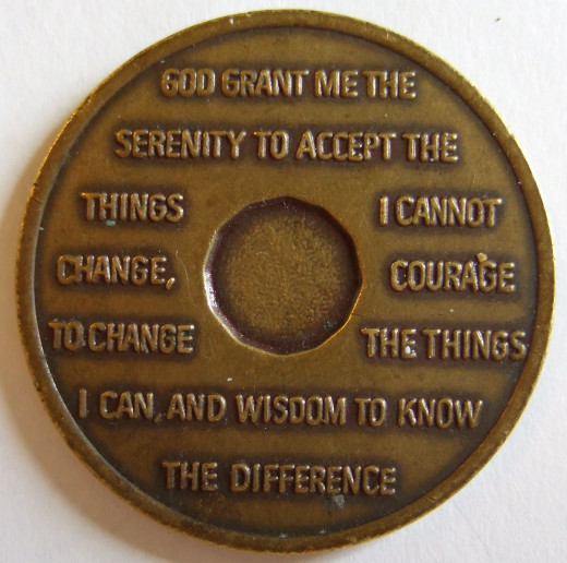 A coin showing the Serenity Prayer, by Reinhold Neibuhr.