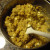 Mixing butterscotch and white chocolate chips into the batter Mixing butterscotch and white chocolate chips into the batter