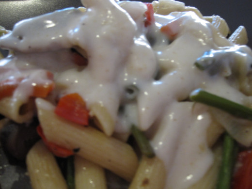 Roasted vegetable penne paired with a white sauce