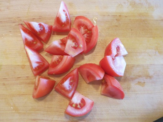Tomatoes and onion are cut in relatively big pieces.