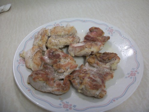 I cut up some and already ate a few pieces before this photo was taken. This is some good eating.  This photo shows chicken breast and chicken thighs.  Brown them to your liking.