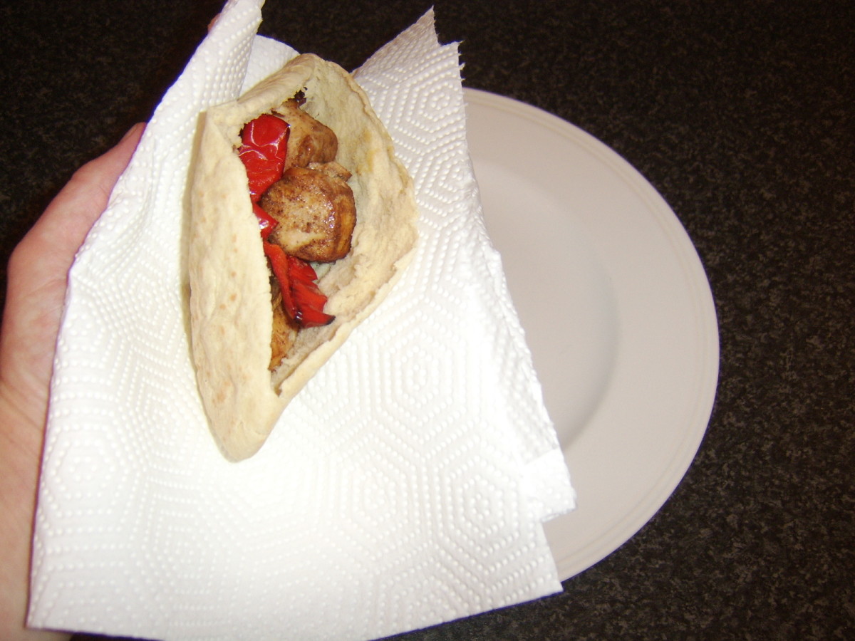 Chicken and vegetables are carefully stuffed in to pitta bread