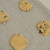 Flatten them slightly with your palm. Flatten them slightly with your palm.
