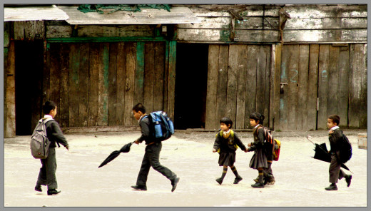 A group of kids on their way to or from school. Some of these students may struggle with learning disabilities.