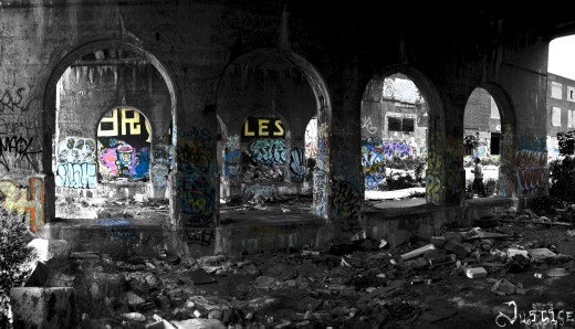 Under a bridge where the homeless live.