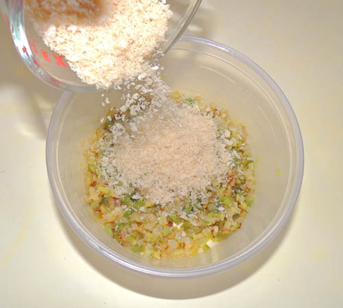 Grab your reserved sauteed veggie mix (celery, bell, shallots & garlic) and add half the Panko breadcrumbs