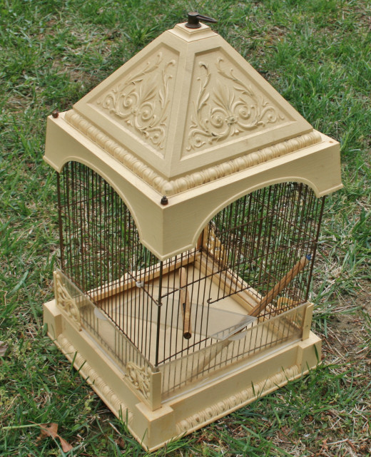 After about a month of searching, I finally found a birdcage I liked that was just right for my purposes--a birdcage planter!