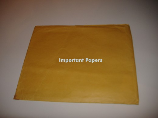 Keeping important papers in a folder or other sturdy container makes it easy to grab in case of an emergency.