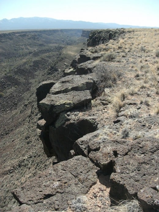The rim of the Rio Grande Gorge is lined with volcanic rocks