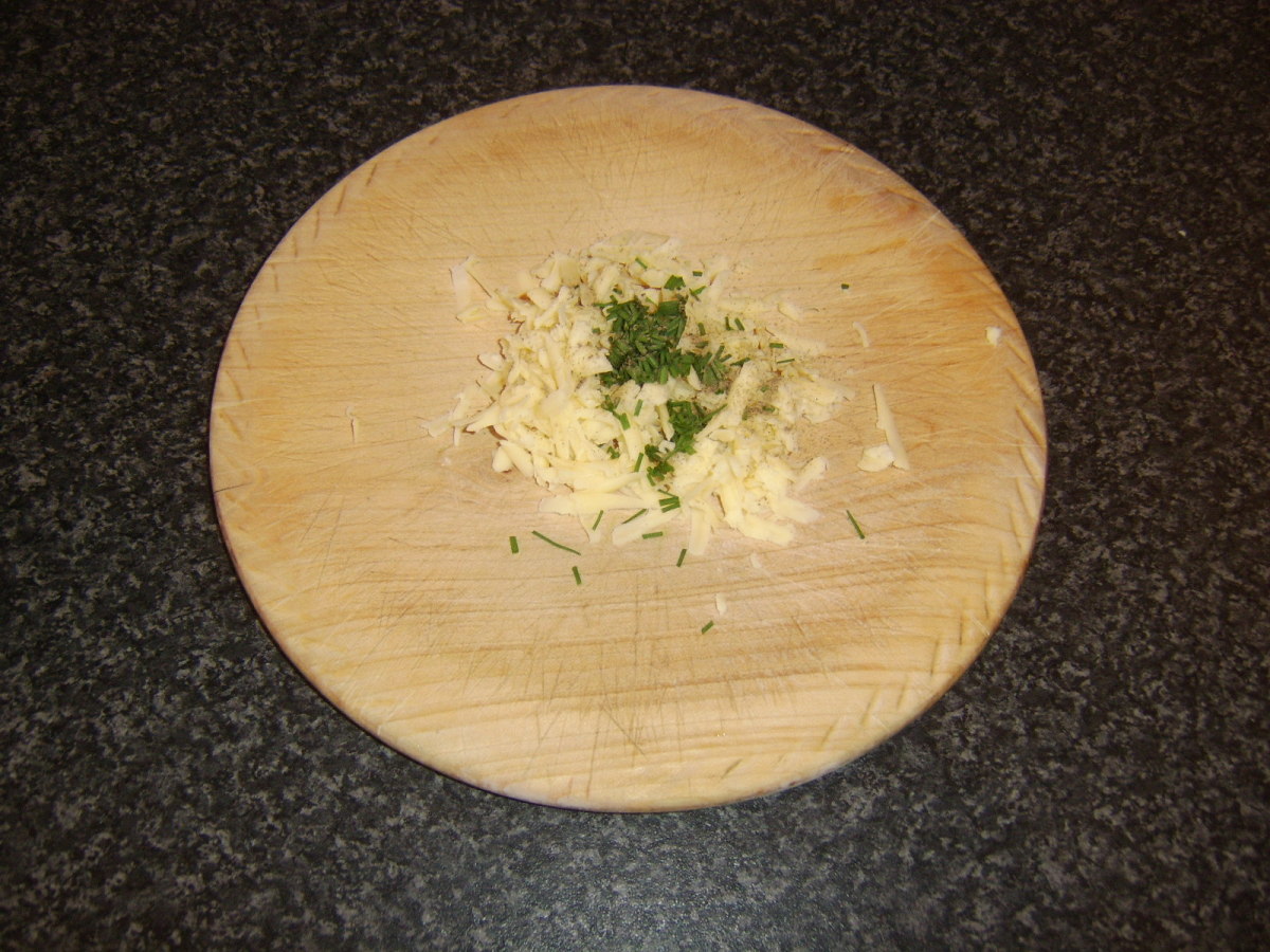Grated cheddar cheese, chives and black pepper