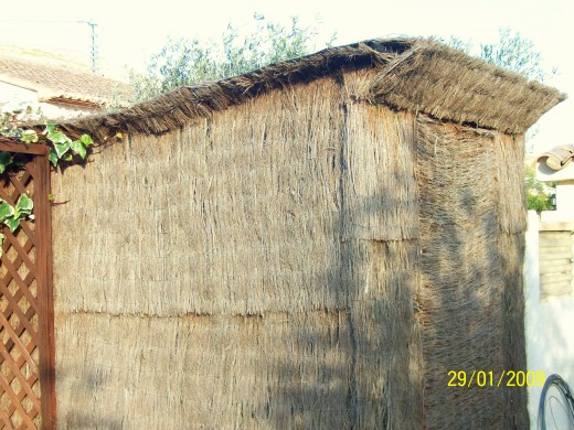 A brushwood shed to store wood for the woodburner