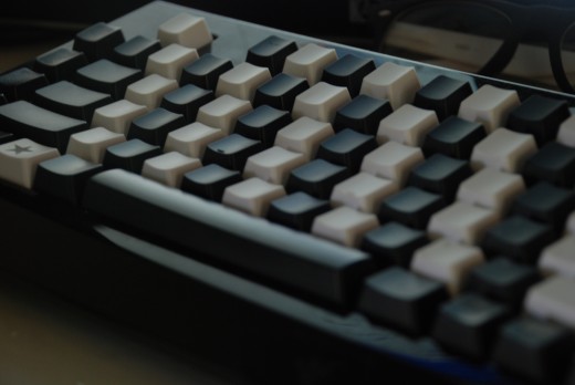 The final product. The bottom row isn't supposed to be compatible, but aside from the space bar which doesn't fit at all, the problem seems to be just a few smaller keys, which I can live with.