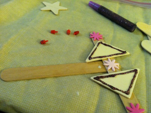 My daughter inspired my to think outside the box (or the star on a stick model) and create this unique variation on a magic wand.