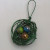 green wire with iridescent beads 