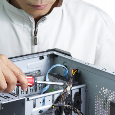 Technician Repairing Computer Hardware
