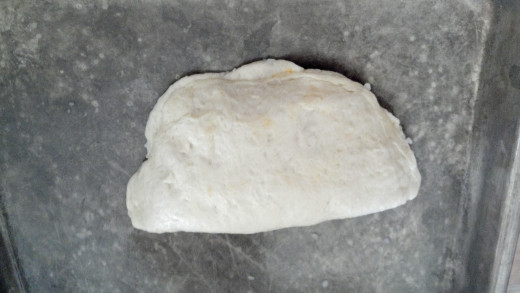 Press the edges of the biscuit together, sealing in the goodness.