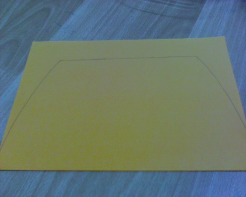 Draw the shape of a simple handbag which looks like half octagon 