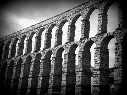 Roman Aqueduct in Segovia, Spain. Without aqueducts, showers would have not been possible back then. 