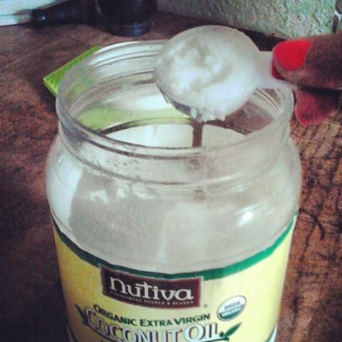 Coconut Oil is solid and white like butter until it reaches 75 degrees and then begins to melt. As Coconut Oil melts, it becomes a clear liquid. Nutrition Facts are included in this article. 