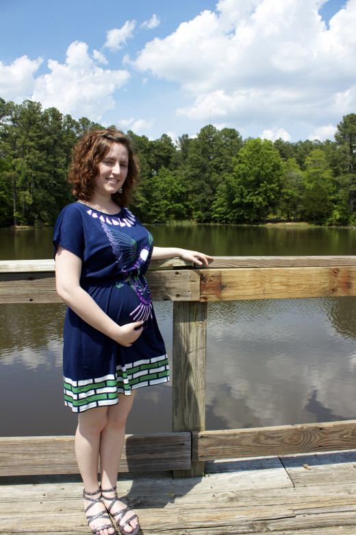 Kasman's pregnant wife. 