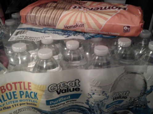 Water and finger foods and snacks are vital to the waiting and the moments immediately after surviving.  A cookie can lend comfort to a child while waiting out a tornado and at the same time it can stablize a person experiencing low blood sugar.  