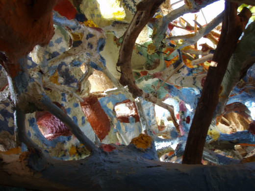 The grotto.  Made of paint, adobe, tires, and telephone poles.   
