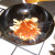 Szechuan sauce is added to stir fry
