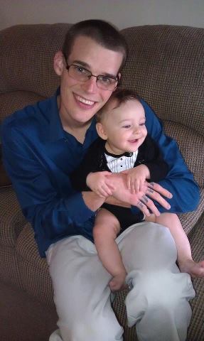 My son with his son, smiling on Easter 2013.  Happy, like father, like son.