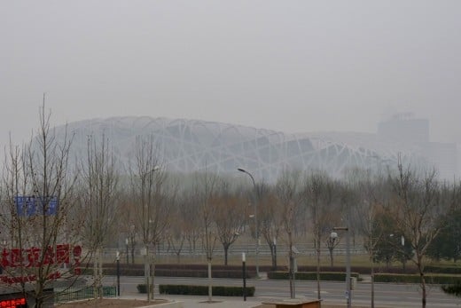 10 a) The Bird's Nest at Olympic Park in the fog