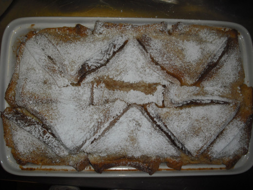 Allow to cool slightly and sprinkle with powdered sugar.  Serve with maple syrup.