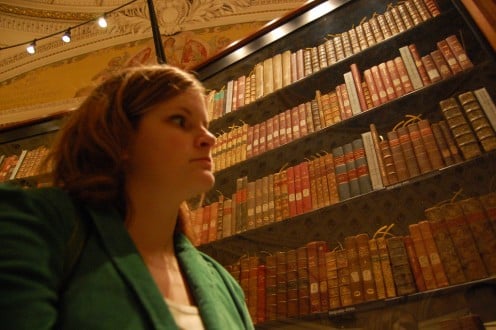 A visitor views the Jefferson Library at the Library of Congress.