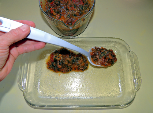 put a light layer of sauce on bottom of casserole